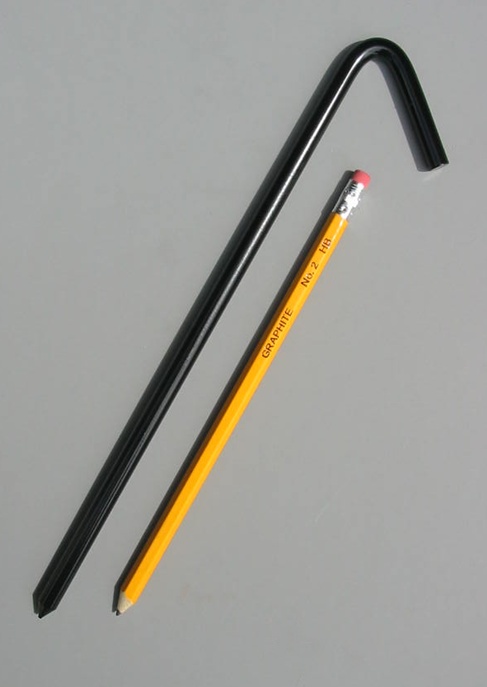 10 inch long steel tarp stake with baked on black enamel painted coating with pencil for scale