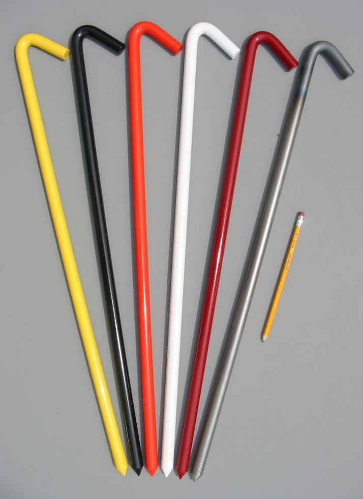 Large 24" hook style tent stakes shown with five enamel options and a pencil for scale